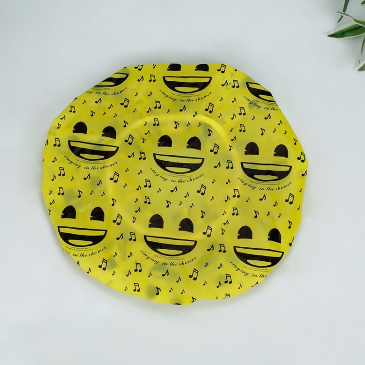 厂家定制生产pevc卡通黄色笑脸音符实用型浴帽-家用