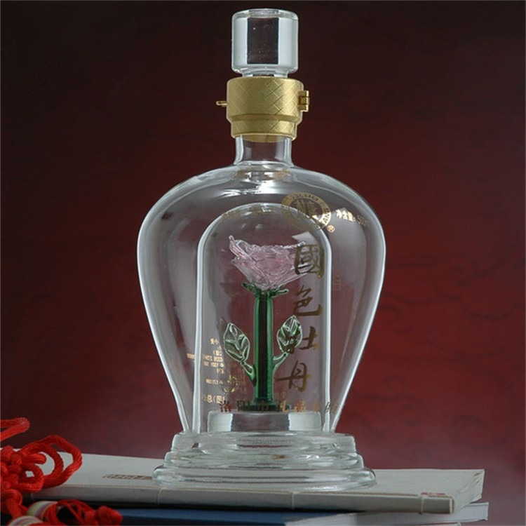 河间玻璃酒瓶厂家生产内置双层花朵造型白酒玻璃瓶